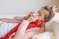 Sick woman with tissue and running nose Royalty Free Stock Photo