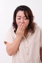 Sick woman suffers from cold, flu, respiratory issue Royalty Free Stock Photo