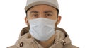 Sick young man handsome wearing medical mask on white background. Royalty Free Stock Photo