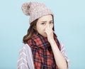 Sick young woman blowing her nose Royalty Free Stock Photo