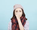 Sick young woman blowing her nose Royalty Free Stock Photo