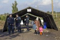 Sid, Serbia - October 3, 2015: Refugees crossing the Serbo-Croatian border between the cities of Sid Serbia and Bapska Croatia