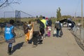 Sid, Serbia - October 31, 2015: Refugees crossing the Serbo-Croatian border between cities of Sid Serbia & Bapska Croatia