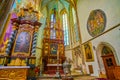 The side aisle with icons and Altar in Baroque style, Church of Our Lady before Tyn, on March 11 in Prague, Czechia