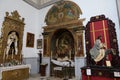 Side altar with different sculptures of the Divino Salvador church in the magical Andalusian town of Cortegana, Huelva, Spain