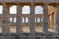 Side-Angle Perspective of the Doric Temple of Segesta, Emphasizing the Rhythm of the Monumental Columns Royalty Free Stock Photo