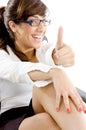 Side angle view of happy accountant with thumbs up Royalty Free Stock Photo