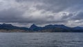 From the side of the Beagle Canal, the coast of Tierra del Fuego is visible.