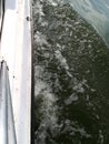 Side of a boat and the water waves