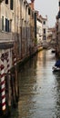 Side Canal Poles Bridges Venice Italy Royalty Free Stock Photo