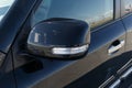 Side car mirror close-up. Details of luxury car. Car detail. Exterior details. Automotive concept Royalty Free Stock Photo