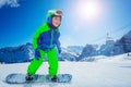 Snowboard boy move fast on the ski resort hill Royalty Free Stock Photo