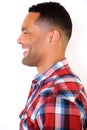 Side close up portrait of young african american guy laughing Royalty Free Stock Photo