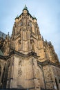Side column of the gothic Vysehrad cathedral in Prague featuring beautiful windows and stone wall and pillars Royalty Free Stock Photo