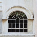 Side of concrete building, There are windows and pipes. Royalty Free Stock Photo