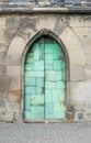 Side door to the Magdeburg Cathedral with green copper plates