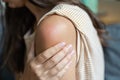 Side effect of the vaccine - shoulder skin redness and pain. Covid-19 vaccination reaction. Woman skin itchy and