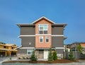 Side entrance door of brand new residential triplex townhouse