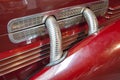 Side exhaust pipes on a classic luxury car