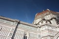 Side facade and details of the cathedral of the famous cathedral of Florence in Italy, on a beautiful day from the clear spring Royalty Free Stock Photo