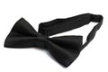Side facing top down view of a black bow neck tie