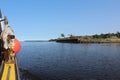 The side of a fishing boat in Atlantic Canada with a gaffe and buoy and pully system