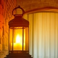 Decorative metallic lantern on interior background. Indoors. Royalty Free Stock Photo