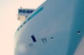 Side of a large passenger ship, windows in the side of the ship, the ship`s captain`s bridge Royalty Free Stock Photo