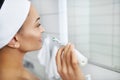 Side large portrait of a young woman holding a toothbrush in her hand Royalty Free Stock Photo