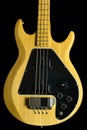 Side Lit Solid Maple Bass Guitar with fine grain, knobs and switches Royalty Free Stock Photo