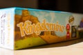 Side logo View of colourful deck family fun game of Kingdomino. Family fun for strategizing and having fun with this entertainment