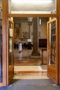 The side massive wooden door to the main hall of the Basilica di San Zeno Maggiore in old part of Verona, Italy Royalty Free Stock Photo