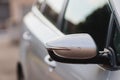 Side mirror of a gray vehicle , Royalty Free Stock Photo