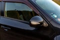 Side mirror with a turn signal of a car closeup Royalty Free Stock Photo