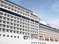 The side of a multi-deck cruise liner. Side view on sky background Royalty Free Stock Photo