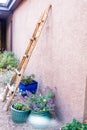 Southwest Adobe Home with ladder on the side in New Mexico Royalty Free Stock Photo