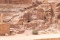 The side part of the well preserved amphitheater carved by Nabatean craftsmen into rock in the Nabatean Kingdom of Petra in the Royalty Free Stock Photo