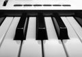 Side, perspective view of electronic synthesizer piano keys Royalty Free Stock Photo