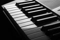 Side, perspective view of electronic synthesizer piano keys Royalty Free Stock Photo