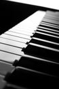 Side, perspective view of electronic synthesizer piano keys Royalty Free Stock Photo