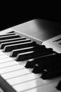 Side, perspective view of electronic synthesizer piano keys Royalty Free Stock Photo