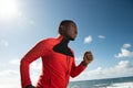 Side of african american man running outside Royalty Free Stock Photo