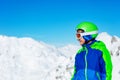 Side portrait of a boy in snowboard ski helmet Royalty Free Stock Photo