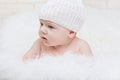 Side portrait of a concentrated baby Royalty Free Stock Photo