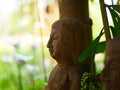 Buddha face in a garden. Royalty Free Stock Photo