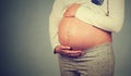 Side profile close up of pregnant woman belly Royalty Free Stock Photo