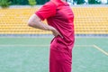 Side profile cropped close up photo of guy having training on green field