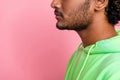 Side profile cropped photo unshaven unrecognizable indian serious man looking copy space skincare promo isolated on pink Royalty Free Stock Photo