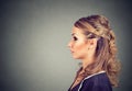 Side profile portrait of a beautiful serious young woman Royalty Free Stock Photo