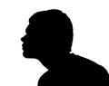 Side profile portrait silhouette of teenage boy leaning forward